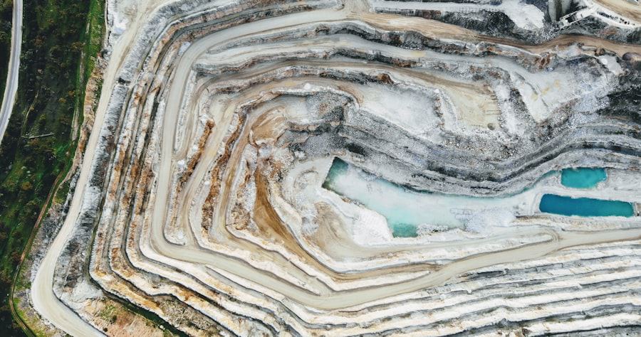 Aerial view of terraced benches in an open-cast mine