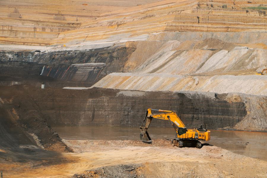 Excavator working the face of a large open-cast mine